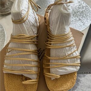 Gold Franco Sarto sandals.